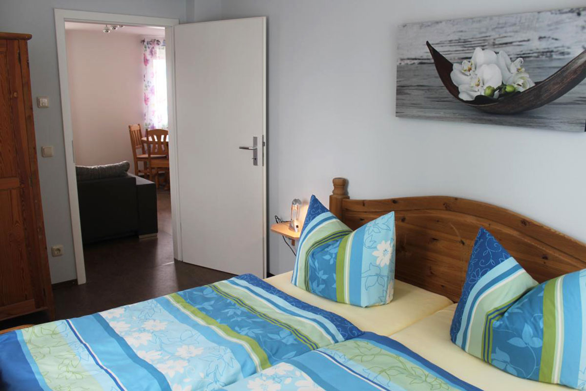 Ferienwohnung Billy in Weißig - Wohnung "Bärenstein" - zweites Schlafzimmer mit Doppelbett