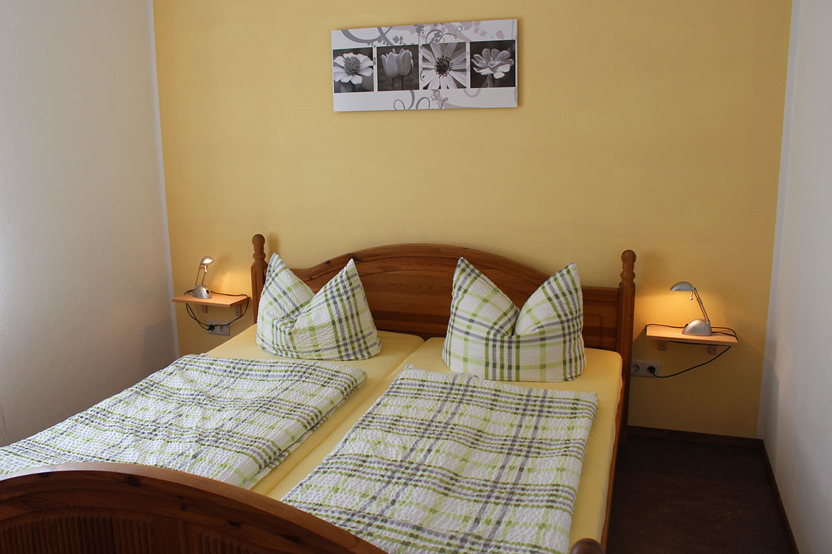 Ferienwohnung Billy in Weißig - Wohnung "Pfaffenstein" - Schlafzimmer mit Doppelbett
